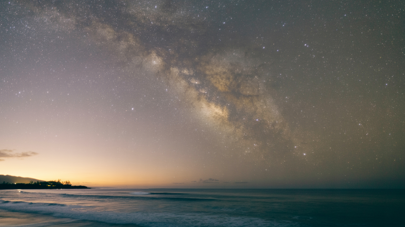 Star-filled Milky Way galaxy stretching across night sky above Pacific Ocean, showing celestial patterns used in traditional Polynesian navigation